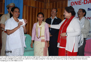 First Lady of Arunachal Pradesh Smt Jyotsna Sharma with Smt M Techi, who received spectacle and medicines as prescribed by the camp ophthalmologists free of cost from First Lady during the �One-day Eye Screening Camp� at Arunachal State Hospital, Naharlagun on 29th March 2014